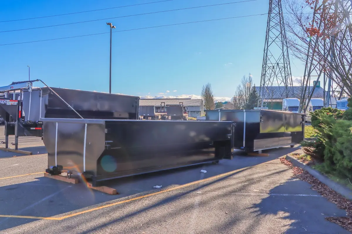 Roll-off dumpster ready for waste disposal at job site for 3 Yard Dumpster Rental in Glasgow
